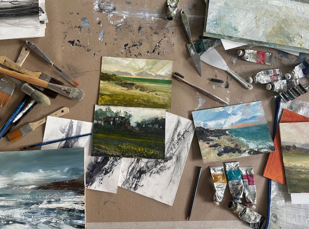 Maggie O'Brien painting demonstrations at NewlynSchool of Art Maggie O'Brien paintings with materials scattered around